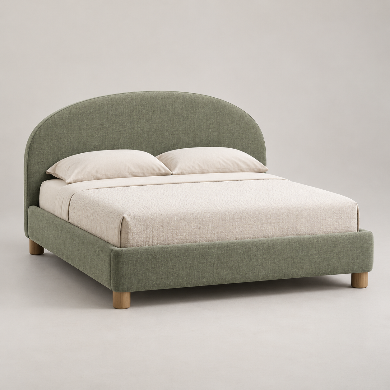 Salvia Upholstered Bed on a pale studio background