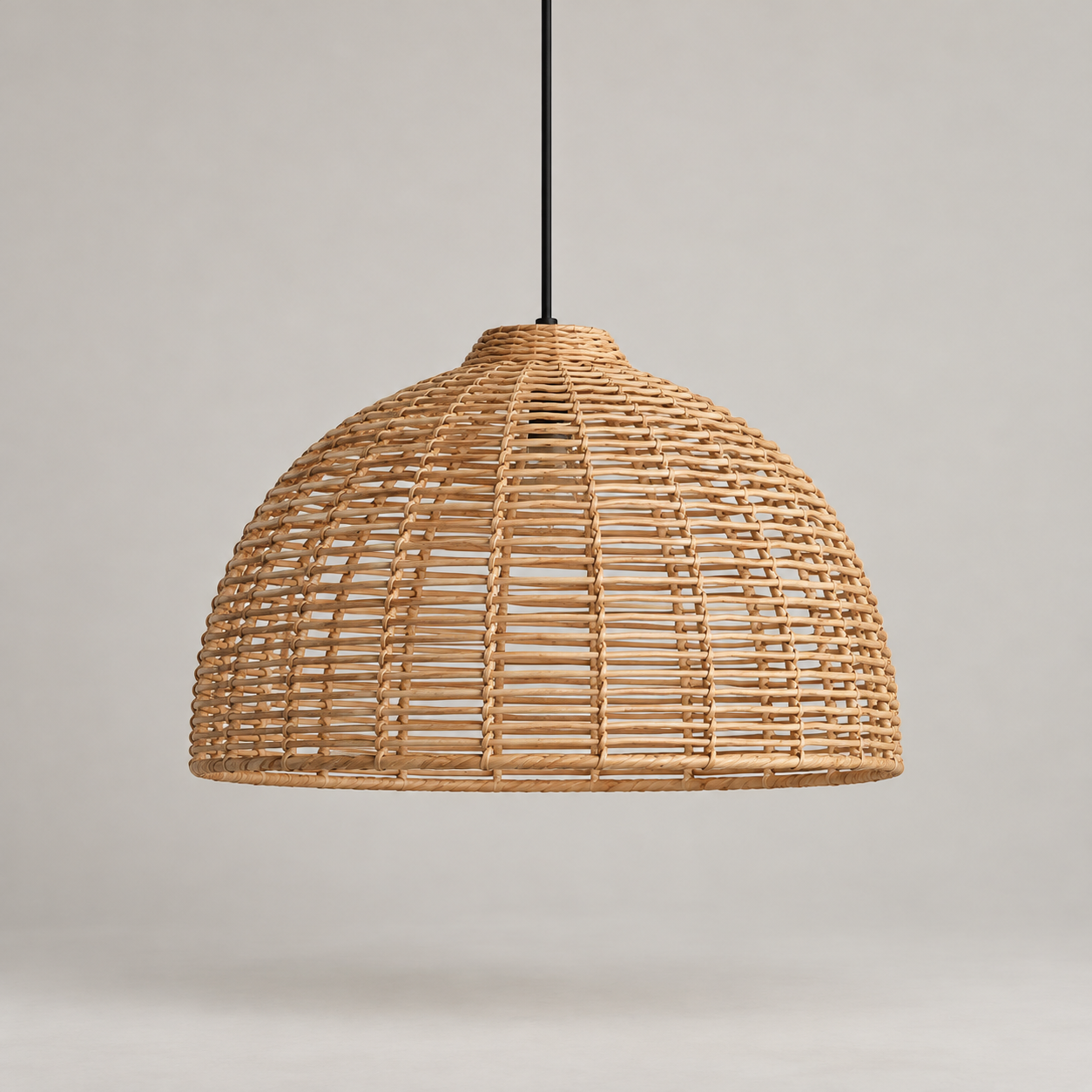 Solana Rattan Pendant on a pale studio background